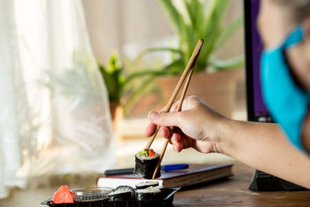 Order sushi at home during  home quarantineの写真素材