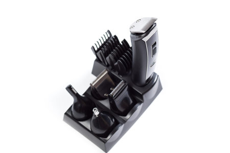 Professional set for barber with attachments isolated on a white background.