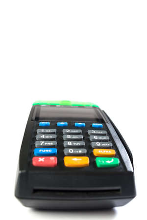 Contactless electronic terminal for paying, isolated on a white background close up.の写真素材