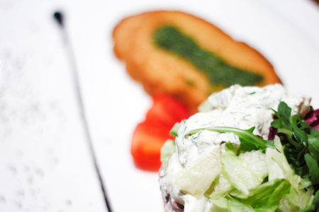 Chicken salad with leaf vegetables and cherry tomatoes