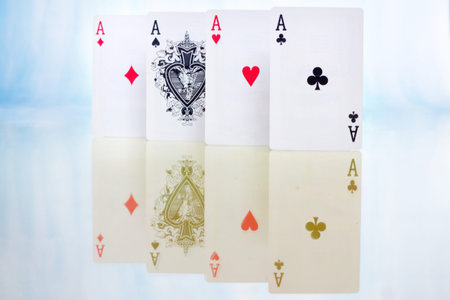 Playing cards on light backgroundの写真素材