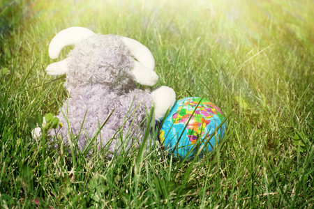 Globe sphere orb model effigy on green grassの写真素材