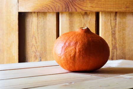 Autumn orange Pumpkin orange on wooden tableの写真素材