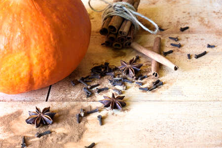 pumpkin and spice on wooden backgroundの写真素材