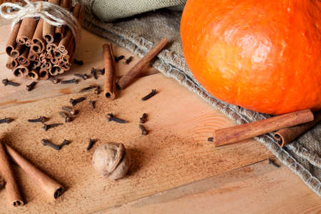 Pumpkins, nuts on table frame with empty spaceの写真素材