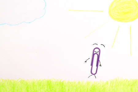 Funny paper clip on a white pfainted backgroundの写真素材