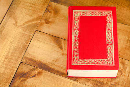 Vintage Book on wooden table. top viewの写真素材