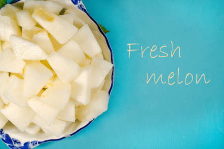 Cantaloupe melon pieces texture backgroundの写真素材