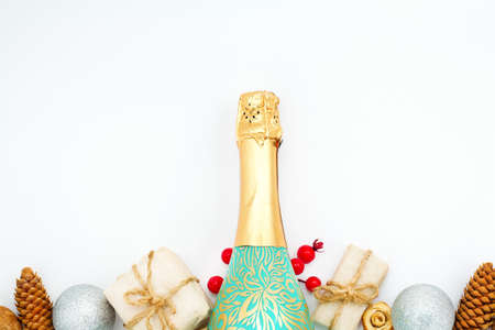The bottle of champagne and gift box. Happy New Year concept. Copy spaceの写真素材
