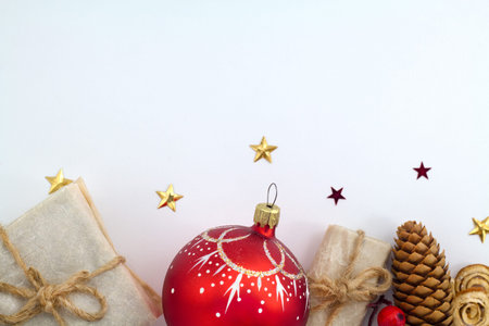 Christmas background with decorations and gift boxes on wooden boardの写真素材