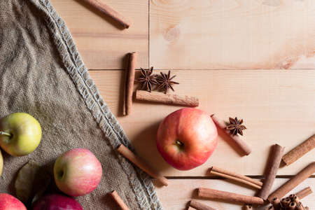 Group of apples on table on wooden backgroundの写真素材
