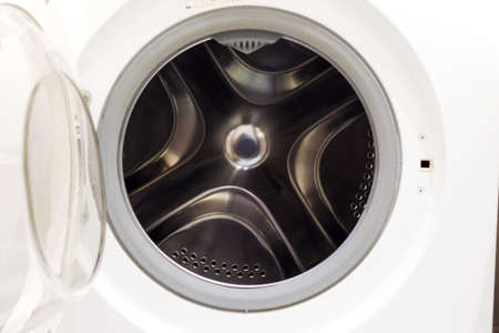 Washing machine automatic. Steel drum open. Closeupの写真素材