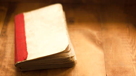 Open Book blank on old wood backgroundの写真素材