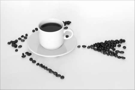 coffee cup and coffee beans in form of arrows on white backgroundの写真素材