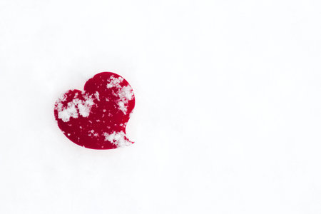 Freeze Red heart in white snow background, Love freeze concept
