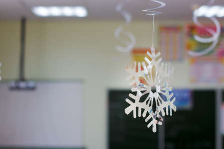 snowflake decor in school classroom . Winter holiday conceptの写真素材