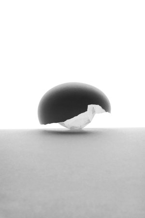 crystal under the shell of eggs on white background. Idea concept