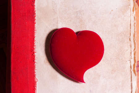 Old Book with red strip and red heartの写真素材