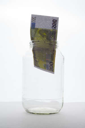 Euro banknote in a transparent glass jar . business or safety and augmentation money conceptの写真素材