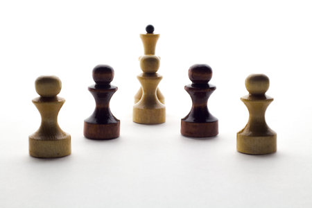 black and white chess pawns and queen on a white background