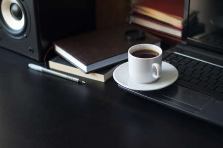 workplace with coffe book notebook and accustic system for creative people . workplace conceptの写真素材