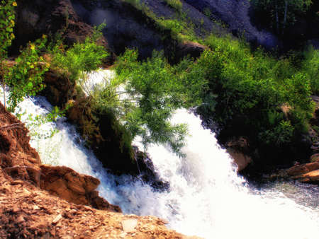 Waterfall in autumn forestの写真素材