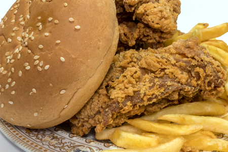 Tasty Fried potatoes with deep fried crunchy spicy chickenの写真素材