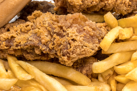 Tasty Fried potatoes with deep fried crunchy spicy chickenの写真素材