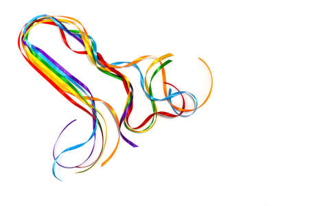Rainbow color ribbon awareness, symbolic color logo icon for equal rights in love and marriage social equality of LGBT community. Isolated on white background, copy space, top view, flat layoutの写真素材