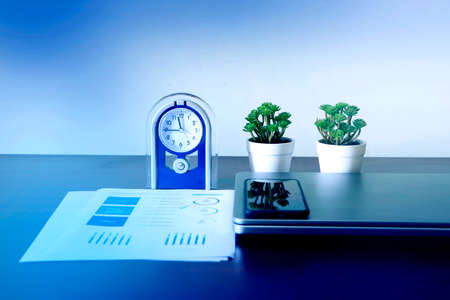 Corporate Business infograph checking sheet along with Laptopの写真素材