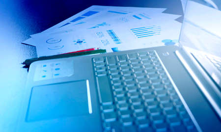 Corporate Business infograph checking sheet along with Laptop, Checking The Company Profit, Marketing & Finance Photo, Finding profit & Lossの写真素材