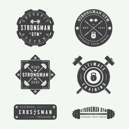 Set of gym vector logos, labels and slogans in vintage styleのイラスト素材