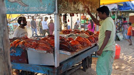India Chennai - 2017 31 december: Fishmongers on the beachのeditorial素材