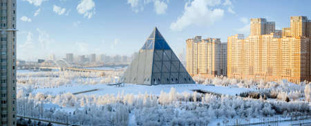 Palace of Peace and Reconciliation and the Kazakh National University of Arts in Nur-Sultan, Kazakhstan, at -24 degrees Celsiusのeditorial素材