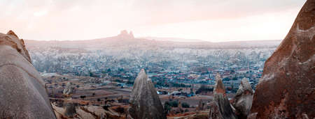 Turkey Cappadocia. View of Uchisar dug and the Goreme valley from the height of unusual mountainsの写真素材