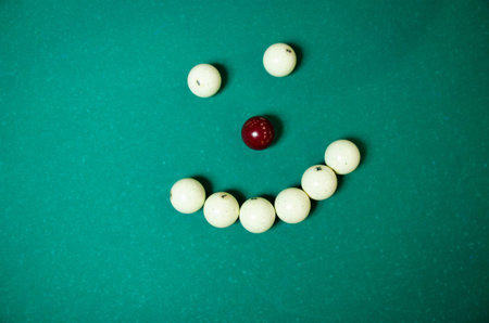 White Pool Ball. a smile from the ball