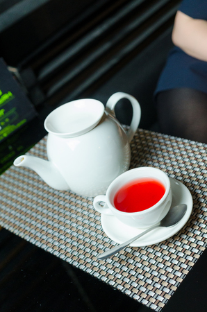 Hot Afternoon Tea Cup on Wood Table Background.の写真素材