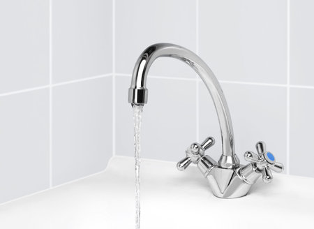 water tap from which the water pours