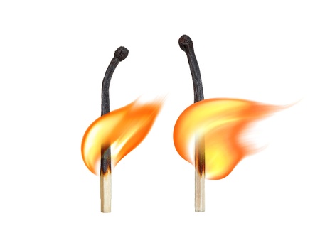 Burning matches on a white background  Symbol of human relationships の写真素材