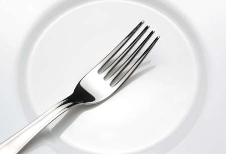 Fork is on the plateの写真素材