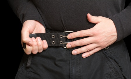 tightening the beltの写真素材