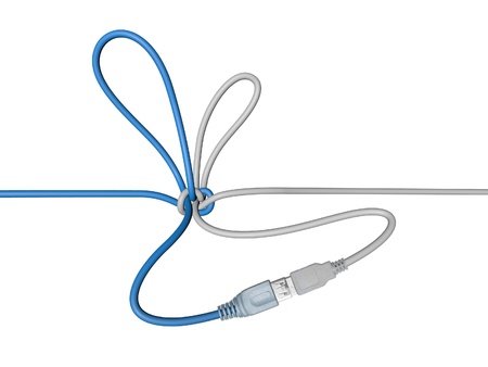 USB wire tied in a knotの写真素材