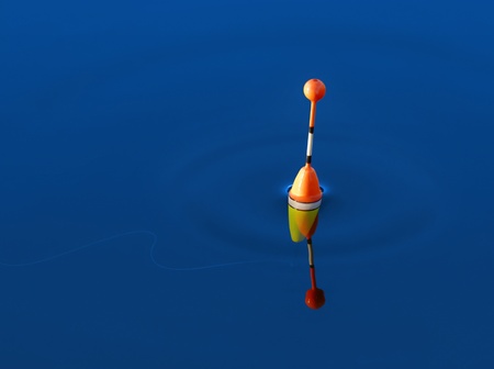 Fishing float floating in the waterの写真素材
