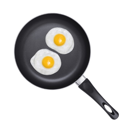 Fried eggs  Pan with handle on white backgroundの写真素材