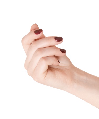 Hand holding something (business card, money), or showing a manicureの写真素材