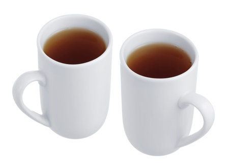 Two cups of tea on a white backgroundの写真素材