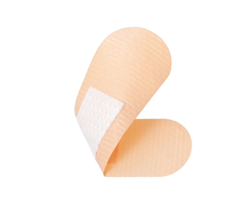 Adhesive bandage on a white backgroundの写真素材