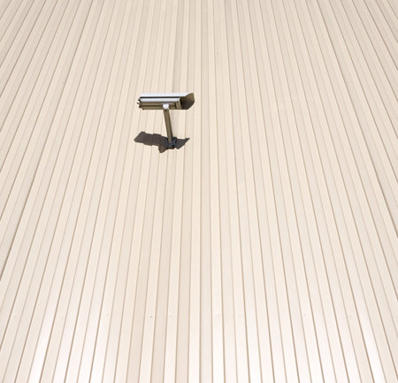 surveillance camera on wall