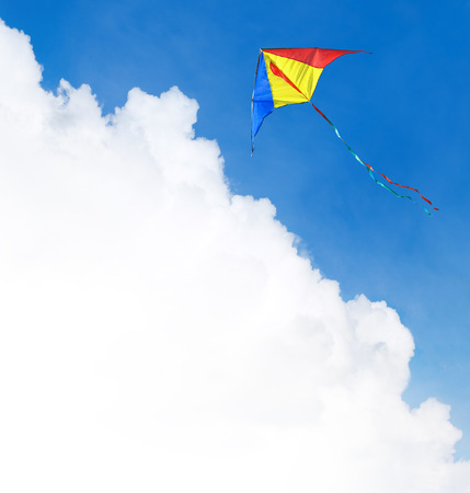 Kite flying in the sky. Template with a text field.の写真素材