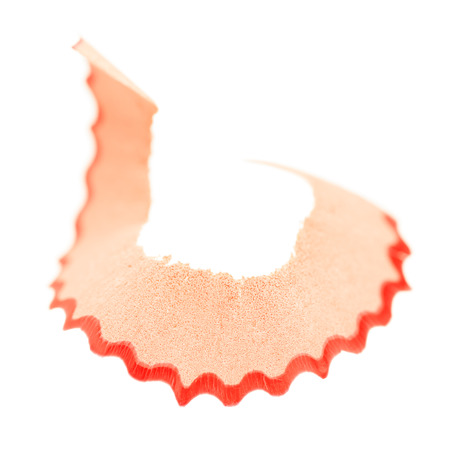 Closeup of pencil shaving on a white backgroundの写真素材